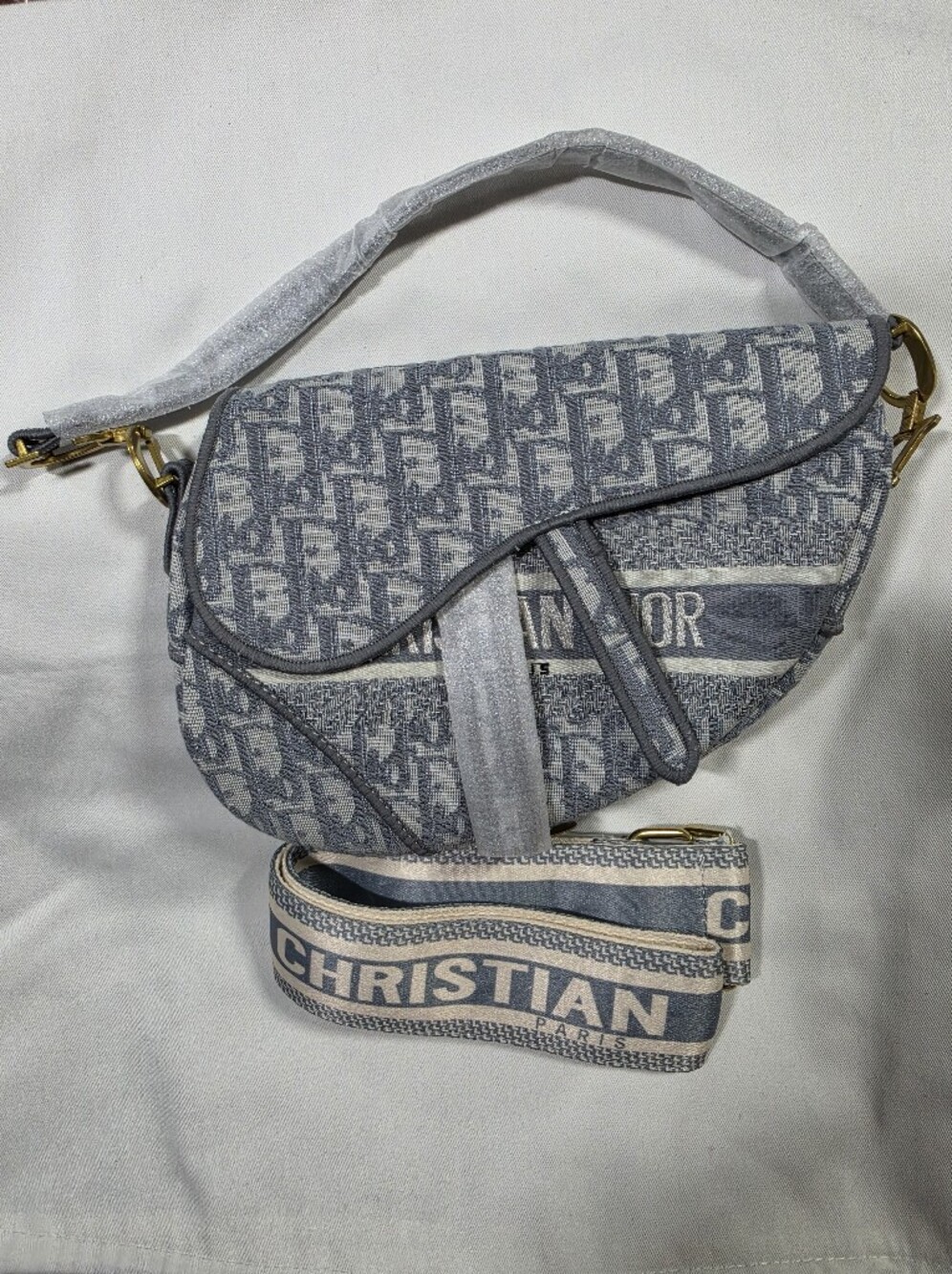 Gray and cream crossbody bag